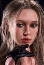 Close-up portrait of Callie with a black glove beneath her chin, smoky eyes, and glossy lips.