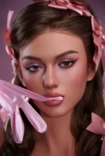 Close-up portrait of Celeste as she touches a pale glove to her lips, with brown curls and pink bows falling at both sides.