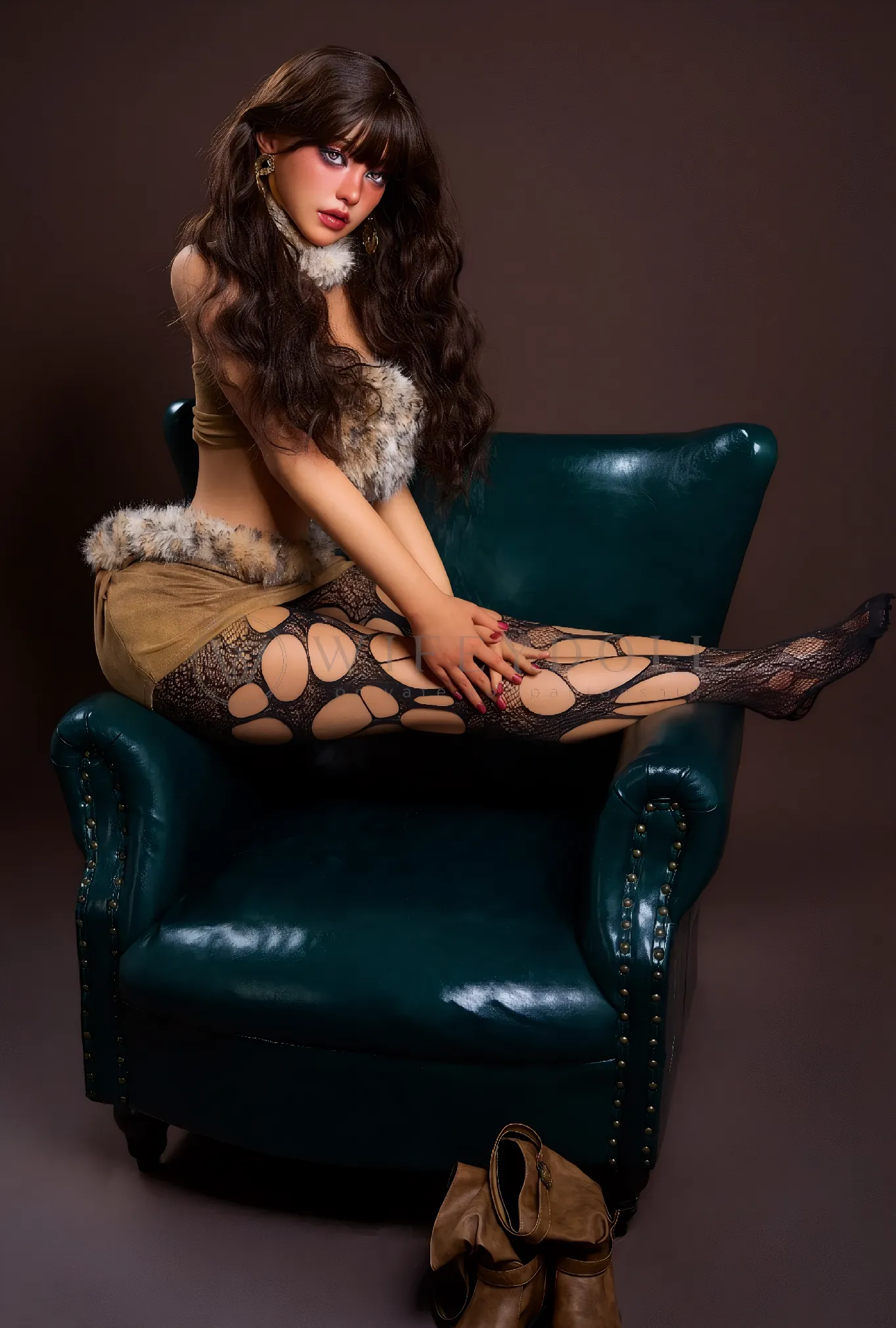 Eileen, a 164cm realistic silicone doll, seated sideways across a teal armchair in patterned stockings and a tan skirt.