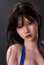 Close-up portrait of Evie, a realistic silicone doll with brown eyes, soft bangs, and long brown hair.
