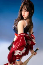 Hanae, a 161cm silicone sex doll, turns back over one shoulder with the baseball bat held behind her and the red jacket lowered around her arms.