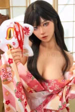 Close-up portrait of Kagura, an Asian silicone doll holding a fox mask.