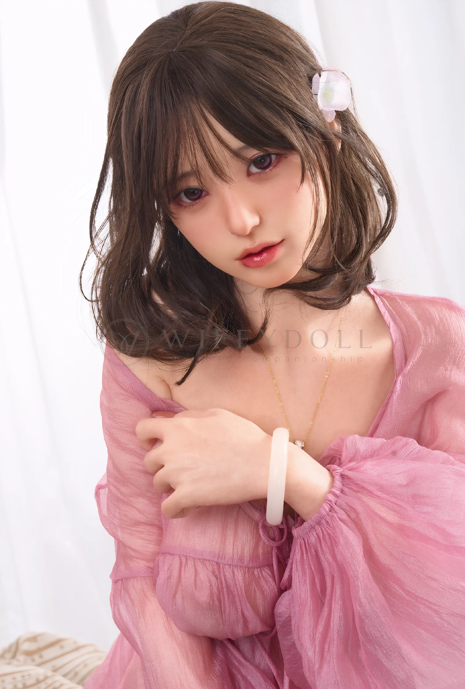Miku 153cm kawaii silicone doll kneels near the floral bench in a pink sheer robe.
