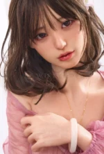 Miku 153cm full-body silicone sex doll stands front-facing by white curtains.