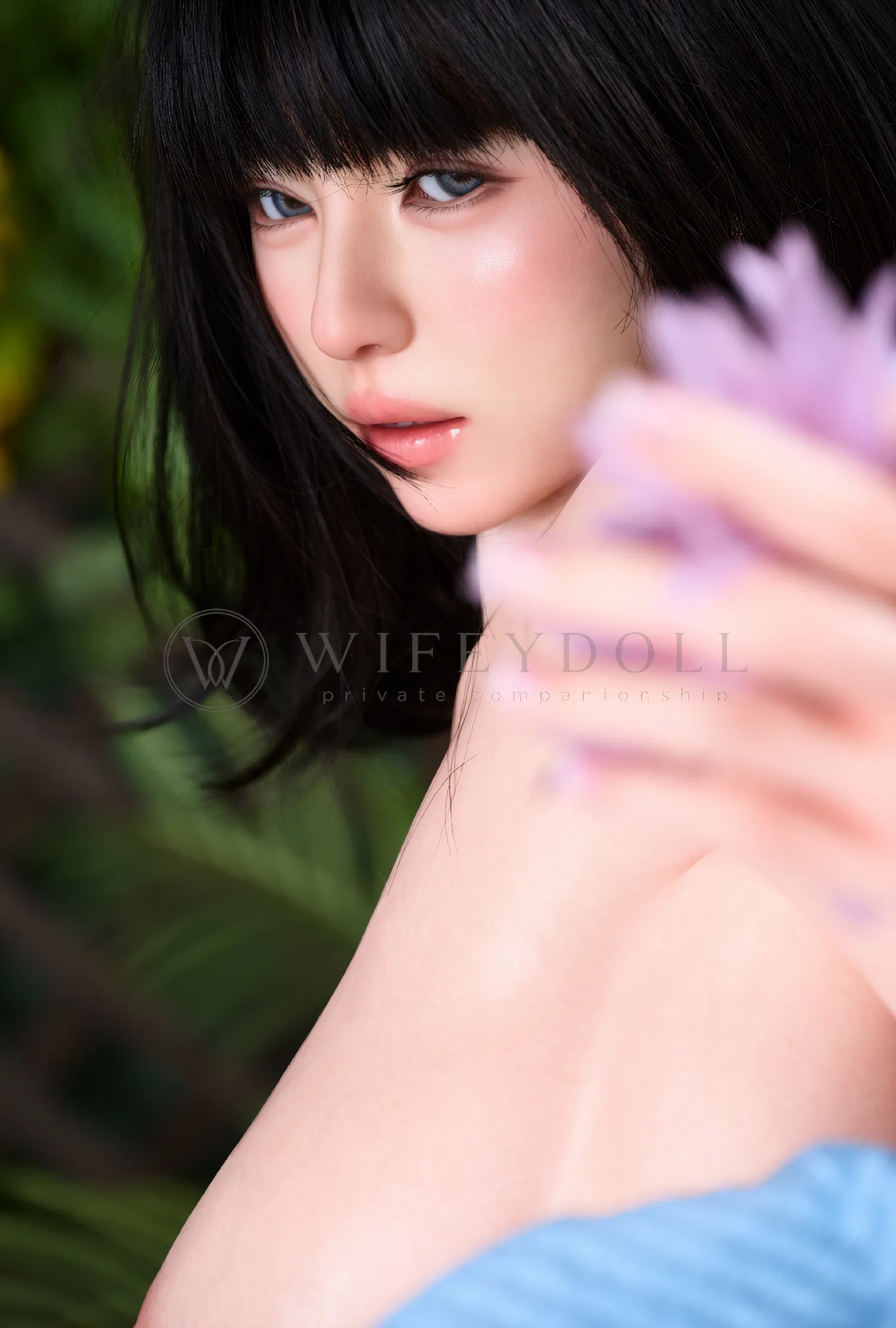 Close-up portrait of Mina with black bob hair and a direct gaze through pink flowers.