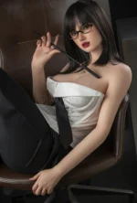 Miya sits in the office, styled in glasses, a white corset, and a black tie.