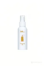 A pump-spray bottle of cleaning oil supplied for compatible silicone doll care.