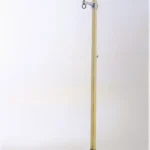 A detailed view of the doll display stand showing the full stand front for stable support.