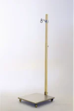A detailed view of the doll display stand showing the full stand front for stable support.