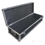 A product view of the protective flight case showing its open interior for safe doll storage and transport.