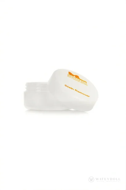 Open stain remover containers displayed with the applicator lids for silicone doll surface care.