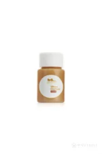 A bottle of tanned-tone silicone repair adhesive for matching compatible warm skin tones.