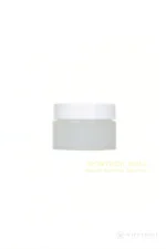 Open stain remover containers displayed with the applicator lids for silicone doll surface care.