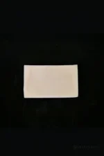 A close-up view of the natural silicone test piece for checking skin tone and material finish.