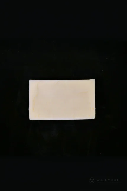 A close-up view of the natural silicone test piece for checking skin tone and material finish.