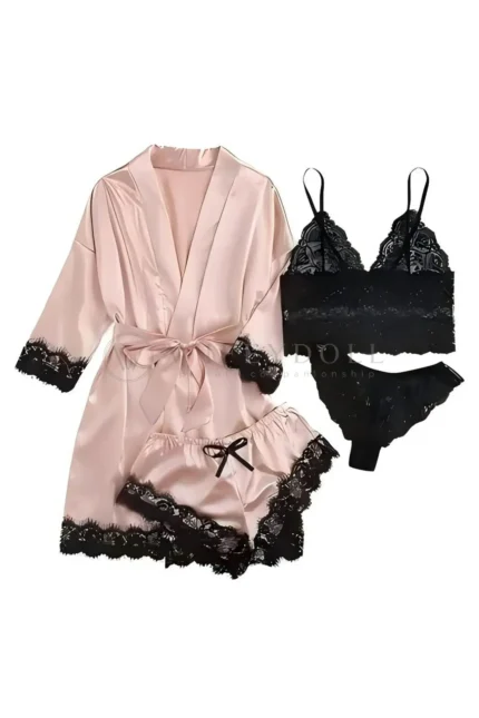 Flat lay of black lace nightwear with a pink satin robe.
