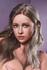 Seraphine, a realistic silicone doll, appears in a close-up portrait with blue eyes, glossy lips, and long silver-blonde waves.