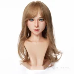 ROS MAX head model S32 in the natural finish paired with hair style H105, shown as a wavy-hair portrait.